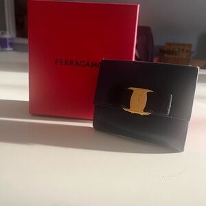 Ferragamo Navy Wallet with Gold Accent